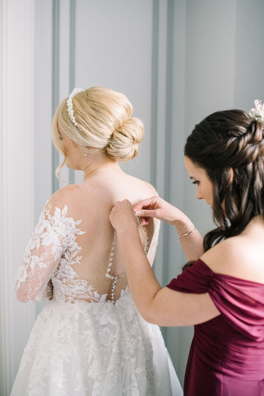 Bride getting ready for her winter wedding at Fairmont Banff Springs.