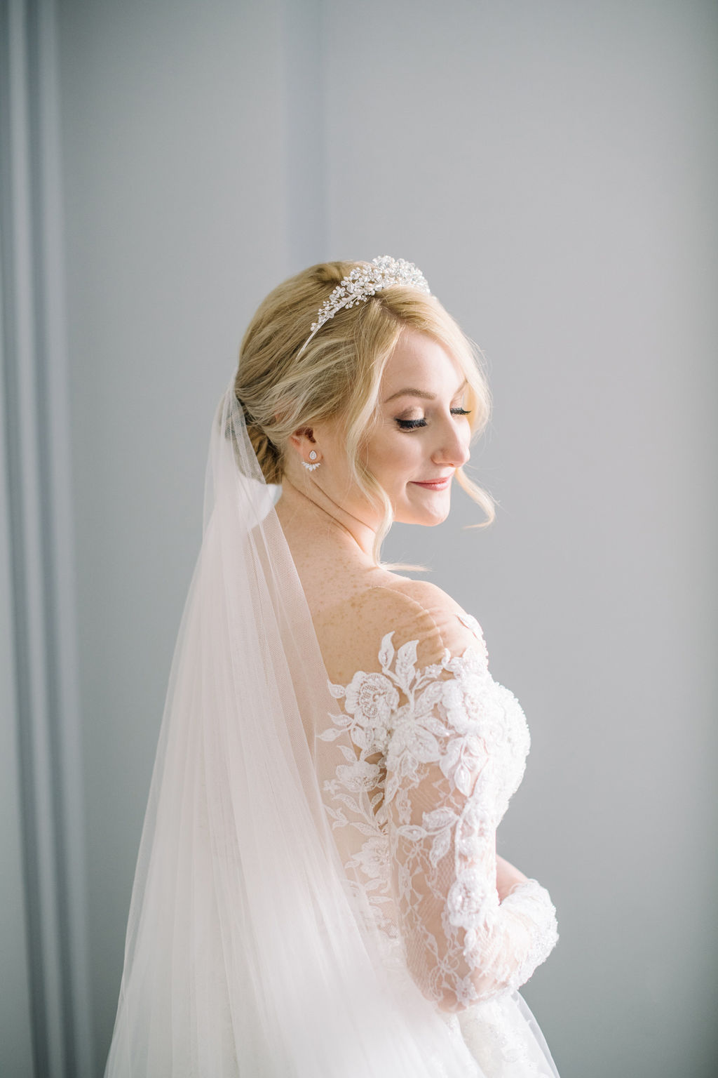 Bride getting ready for her winter wedding at Fairmont Banff Springs.