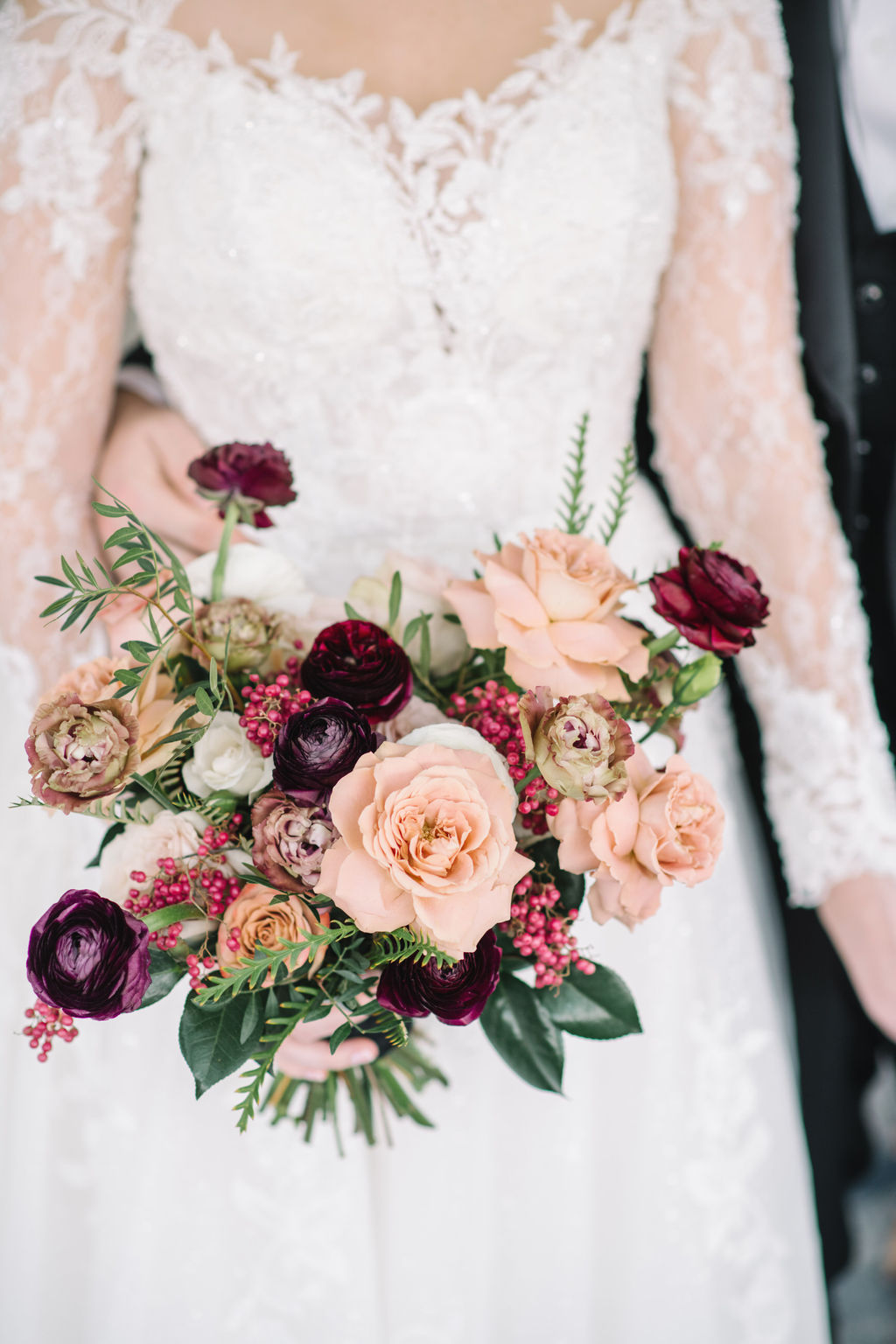 Blush and burgundy bridal bouquet. Winter Wedding Portraits at Fairmont Banff Springs.