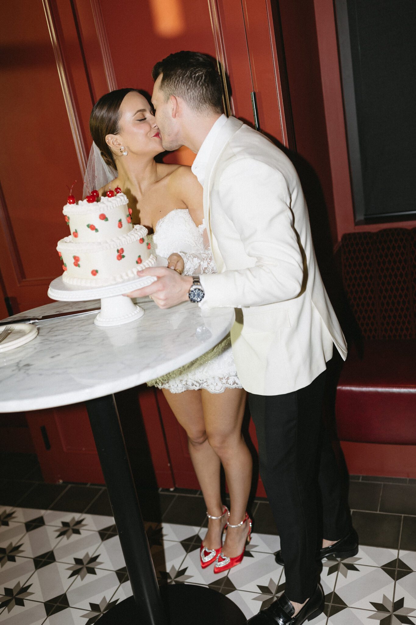 Each and every detail of this inspiration tells a story of timeless romance and unique charm - from the playful hand-drawn stationery, to the vintage-style rosette cake from Cakes by Jen! #cakecutting #weddingcake #vintageweddingcake