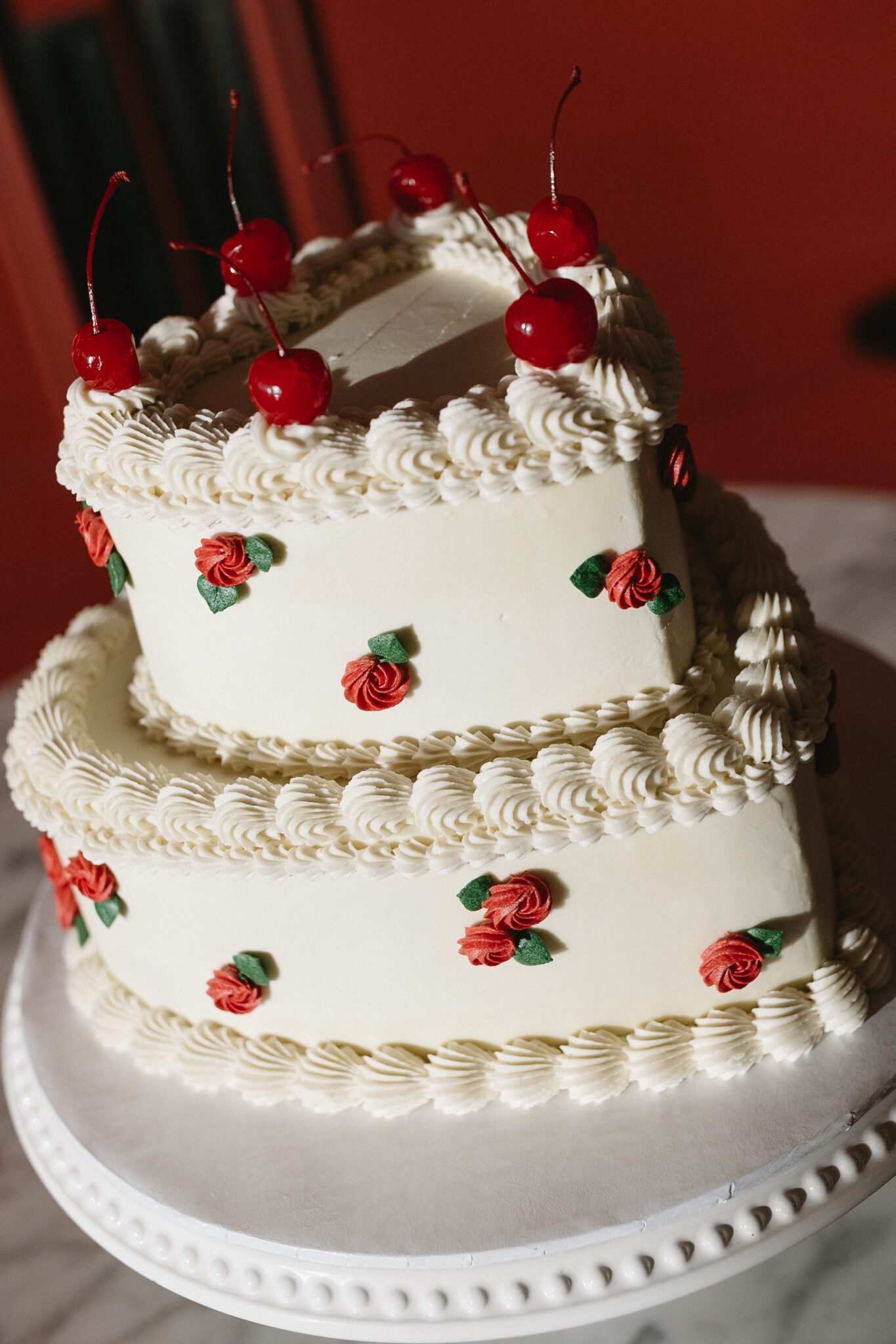 Each and every detail of this inspiration tells a story of timeless romance and unique charm - from the playful hand-drawn stationery, to the vintage-style rosette cake from Cakes by Jen!