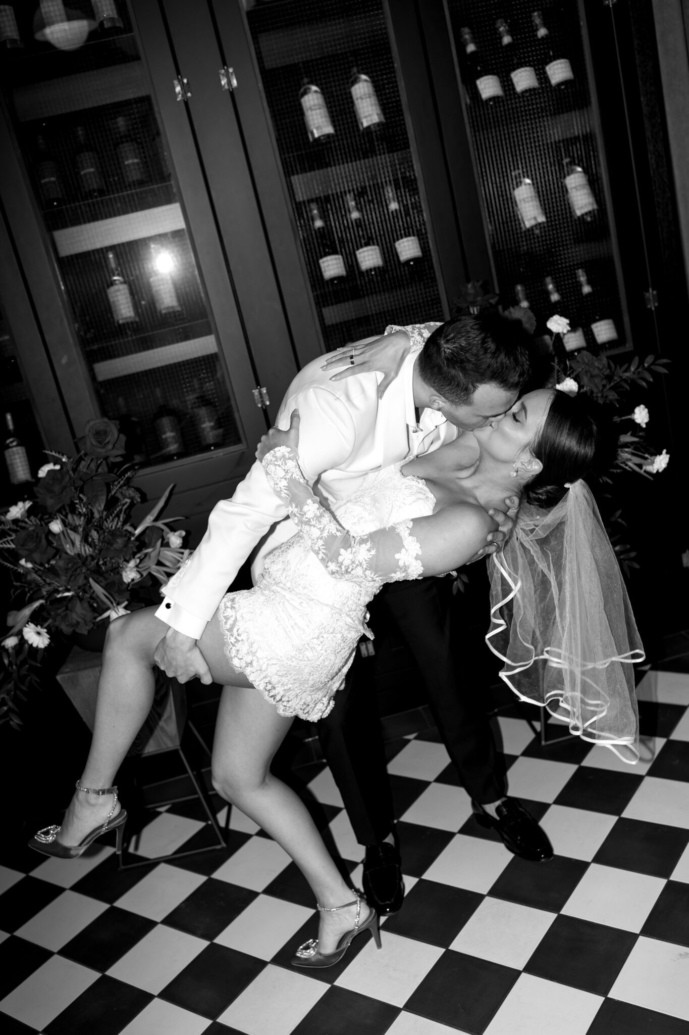 This Italy inspired restaurant wedding inspiration at Buffo Calgary, showcases modern sophistication, vintage charm, retro details, and a vibrant red colour palette. #restaurantwedding