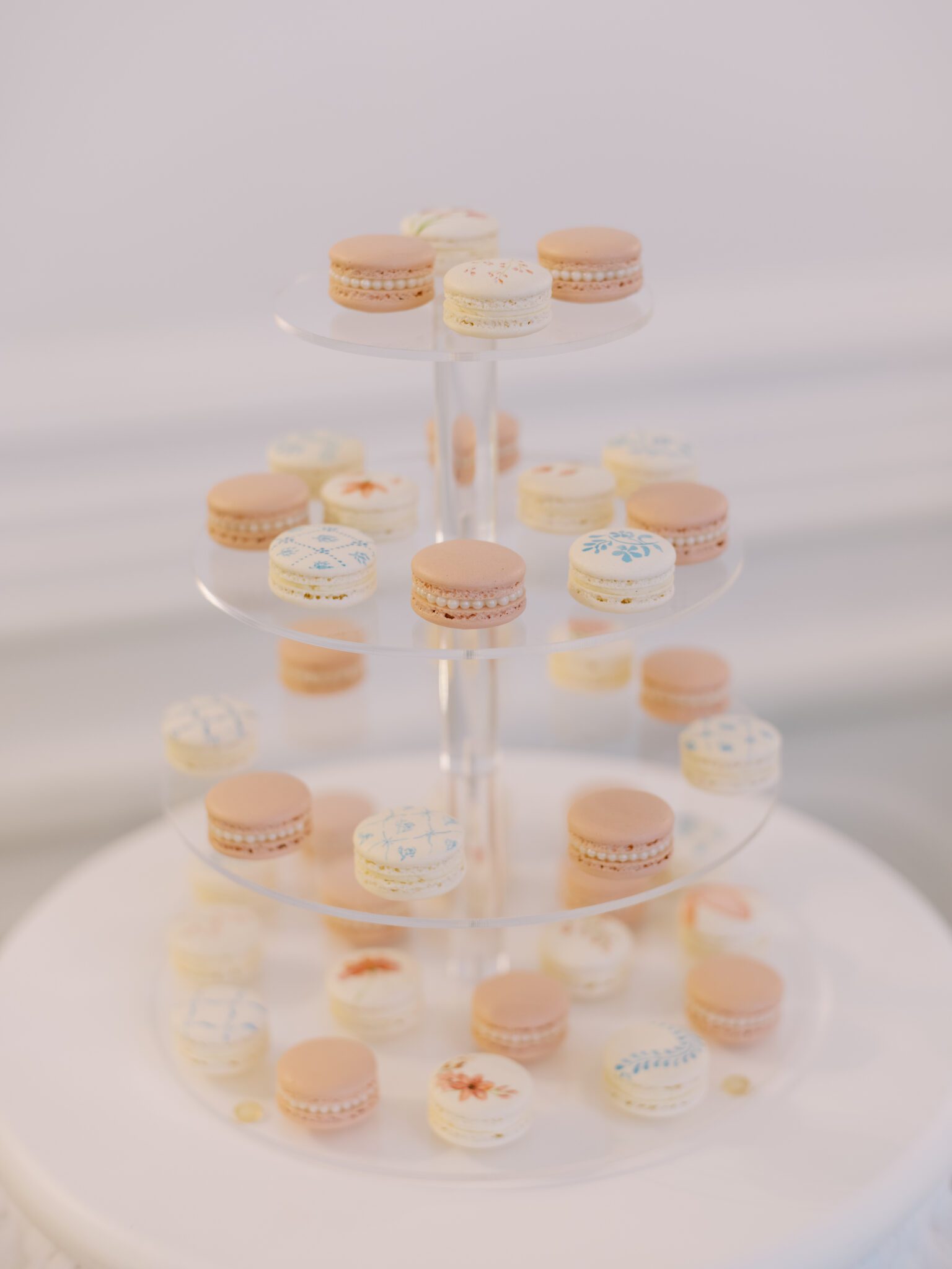 Blush pink macarons on a tiered tray. Whimsical ballet blush pink wedding inspiration at Fairmont Palliser Hotel. 