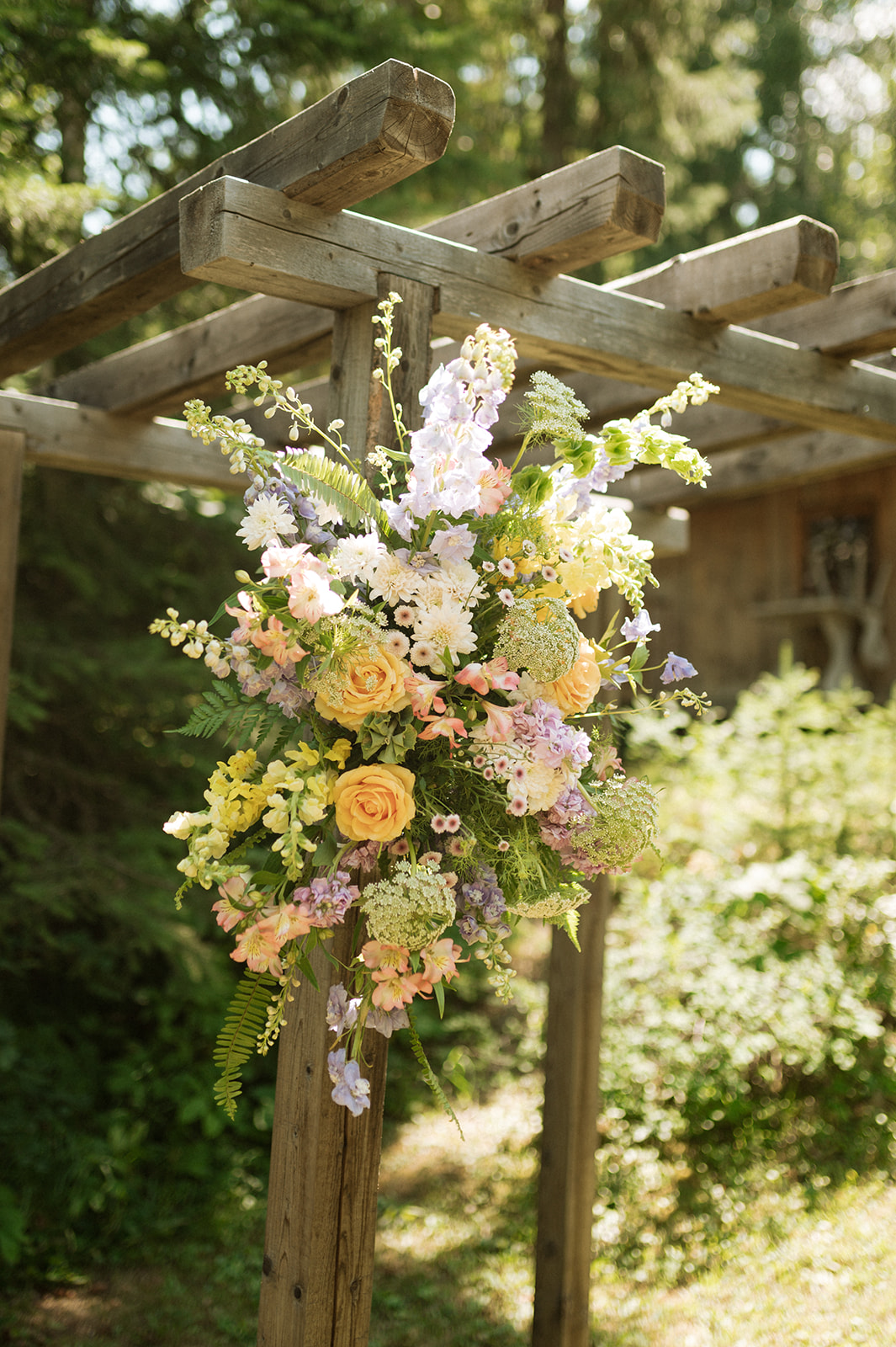 Meadow-Inspired Wedding Ceremony Florals, Colourful wedding florals.