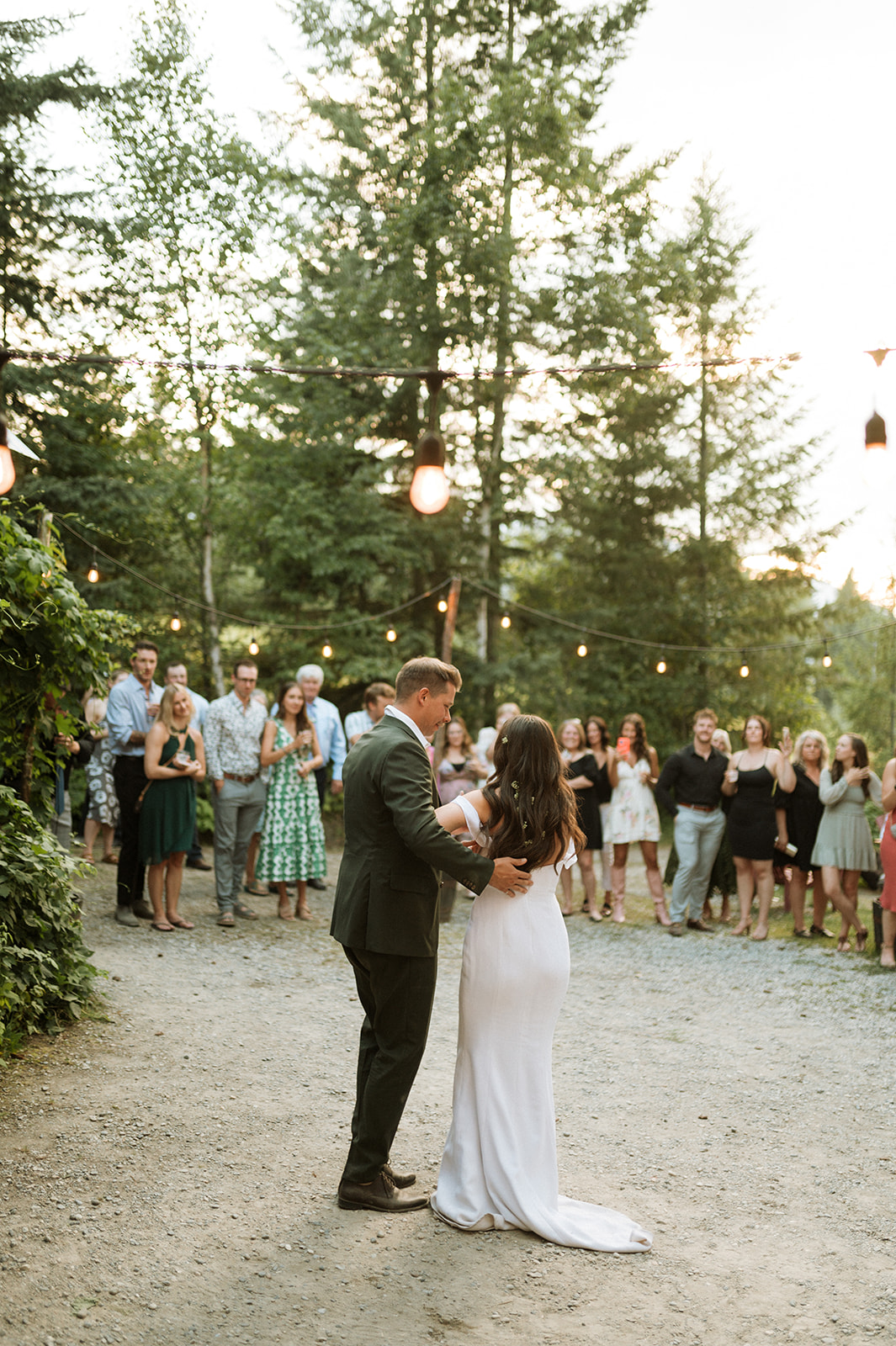Rustic Summer wedding in Kootenay BC, outdoor dance party, bride and groom first dance